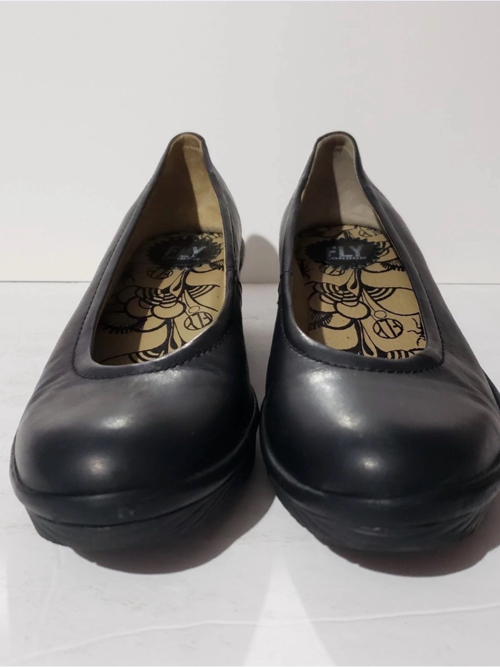 Fly London Black Round-Toe Slip-On Flats